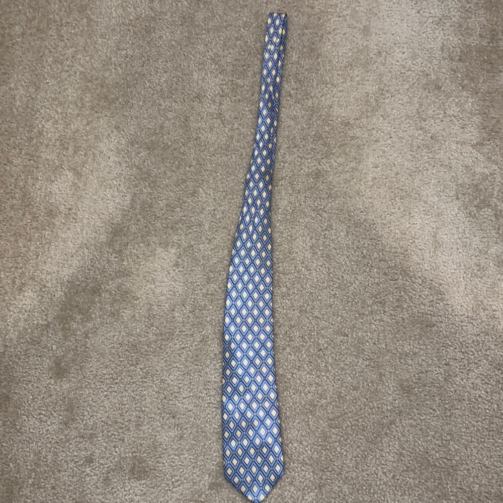 Blue and gold patterned silk tie